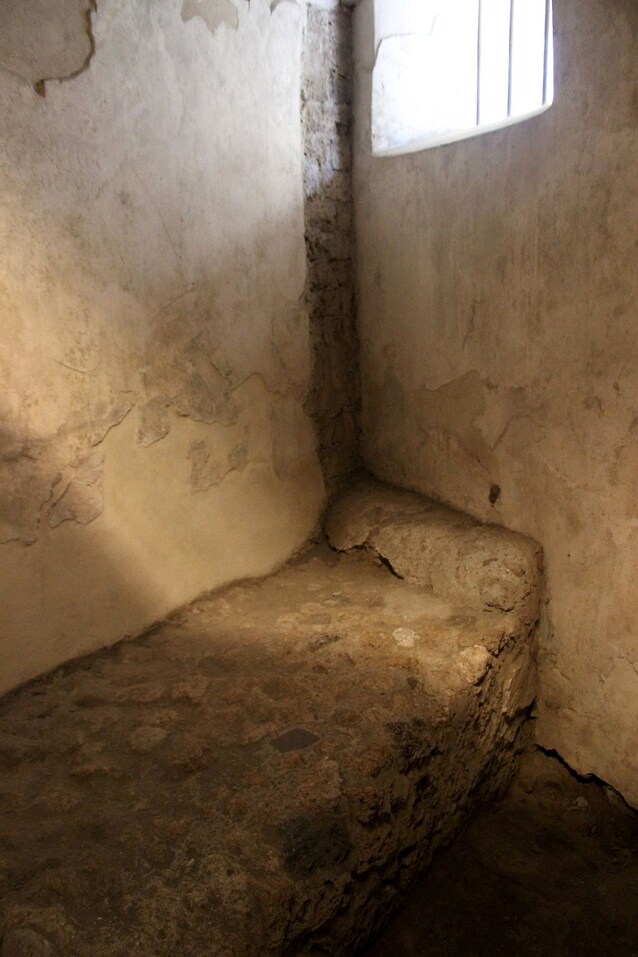 Letto in una delle camere del lupanare