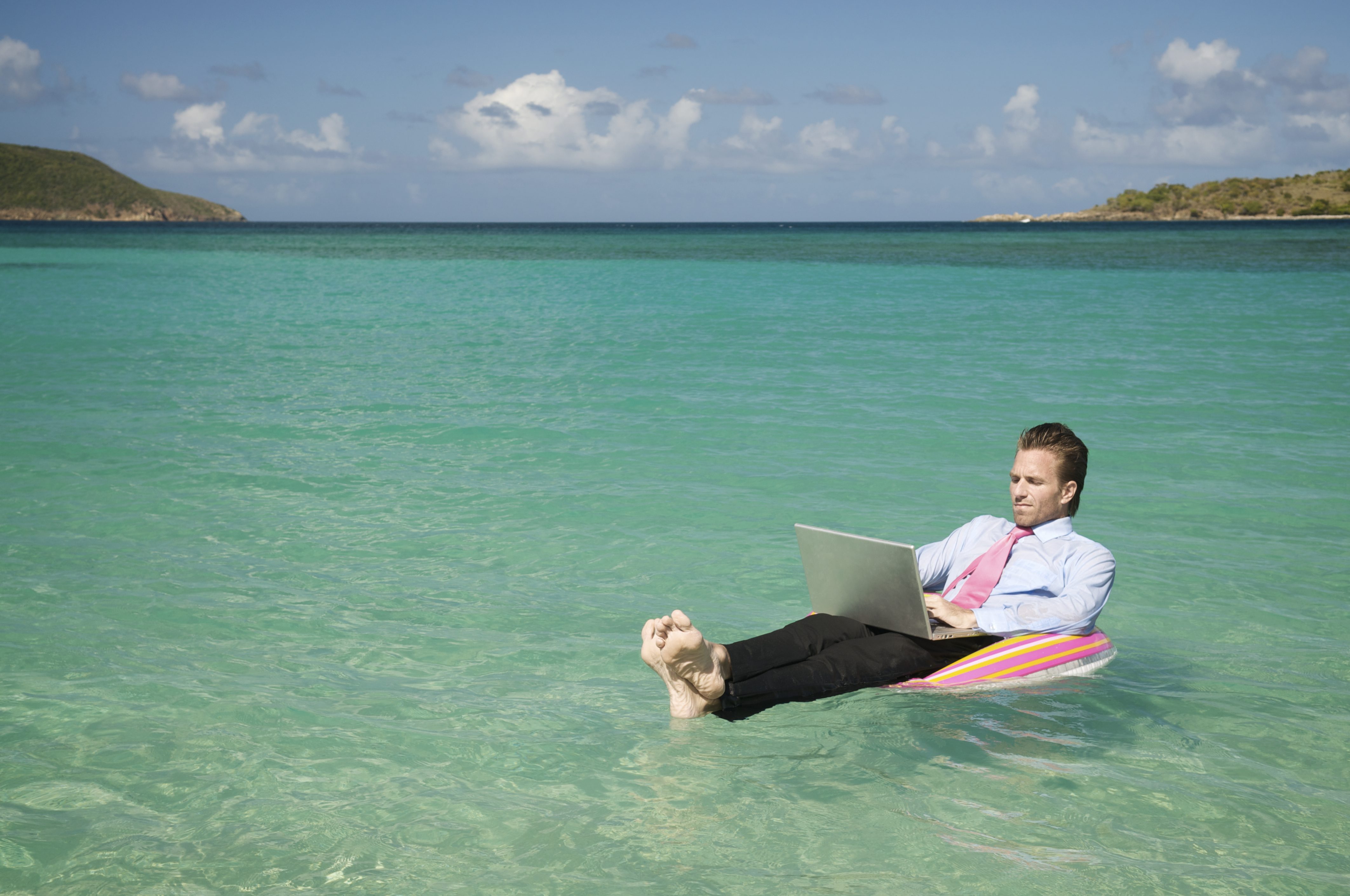 gli italiani lavorano anche in vacanza